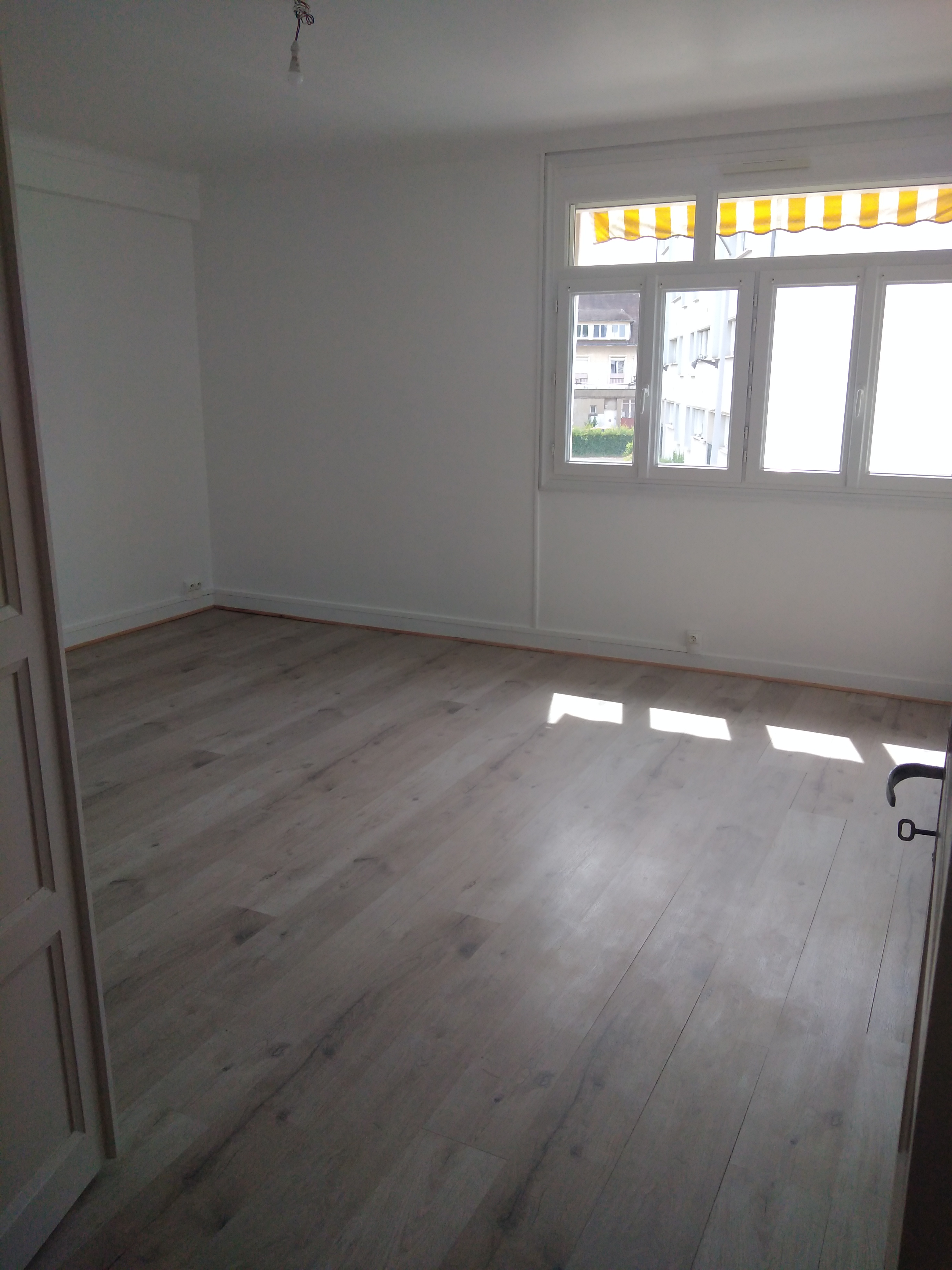 Appartement de type T3 de 78.48 m² avec balcon, cave et garage 