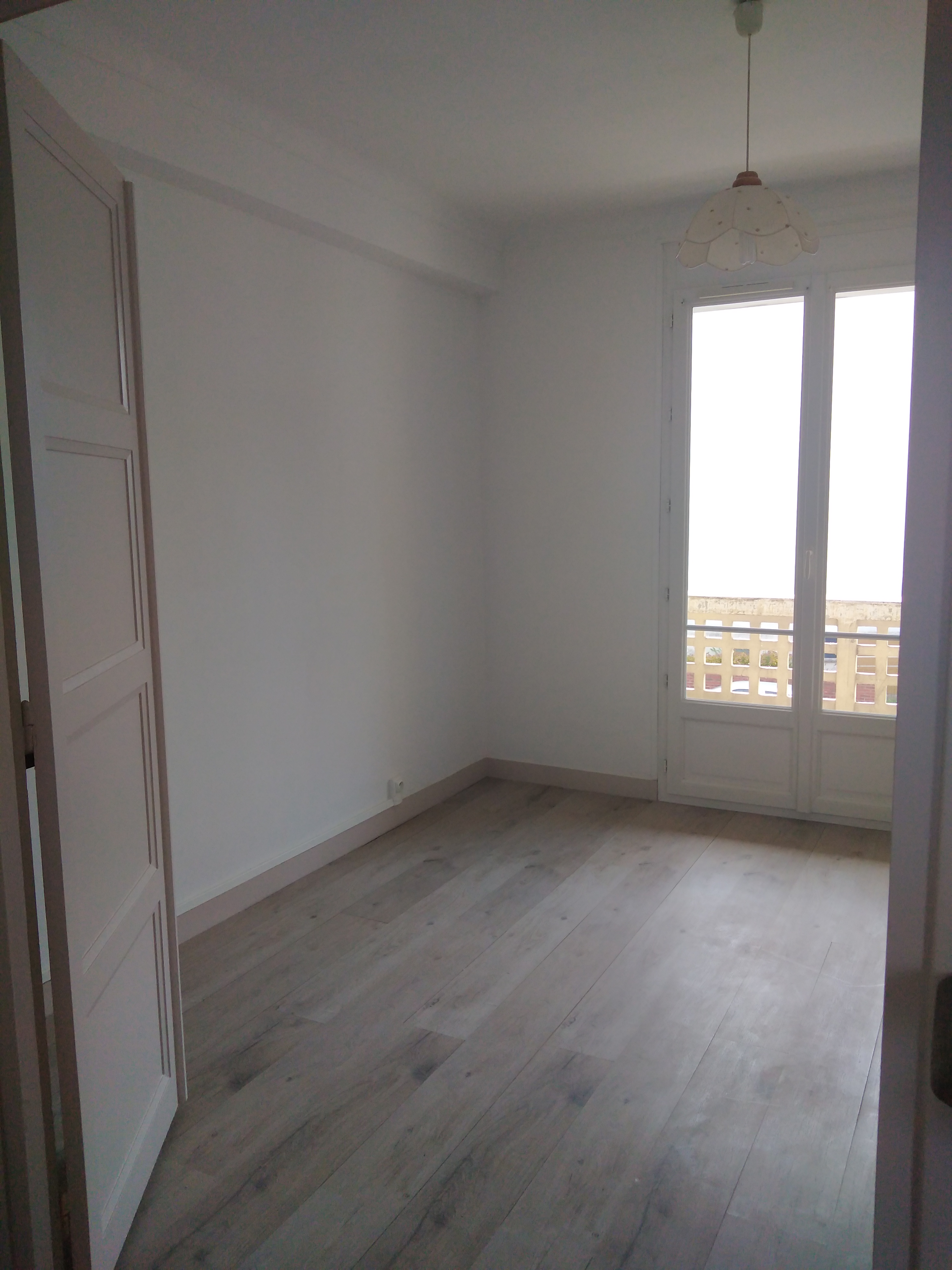 Appartement de type T3 de 78.48 m² avec balcon, cave et garage 