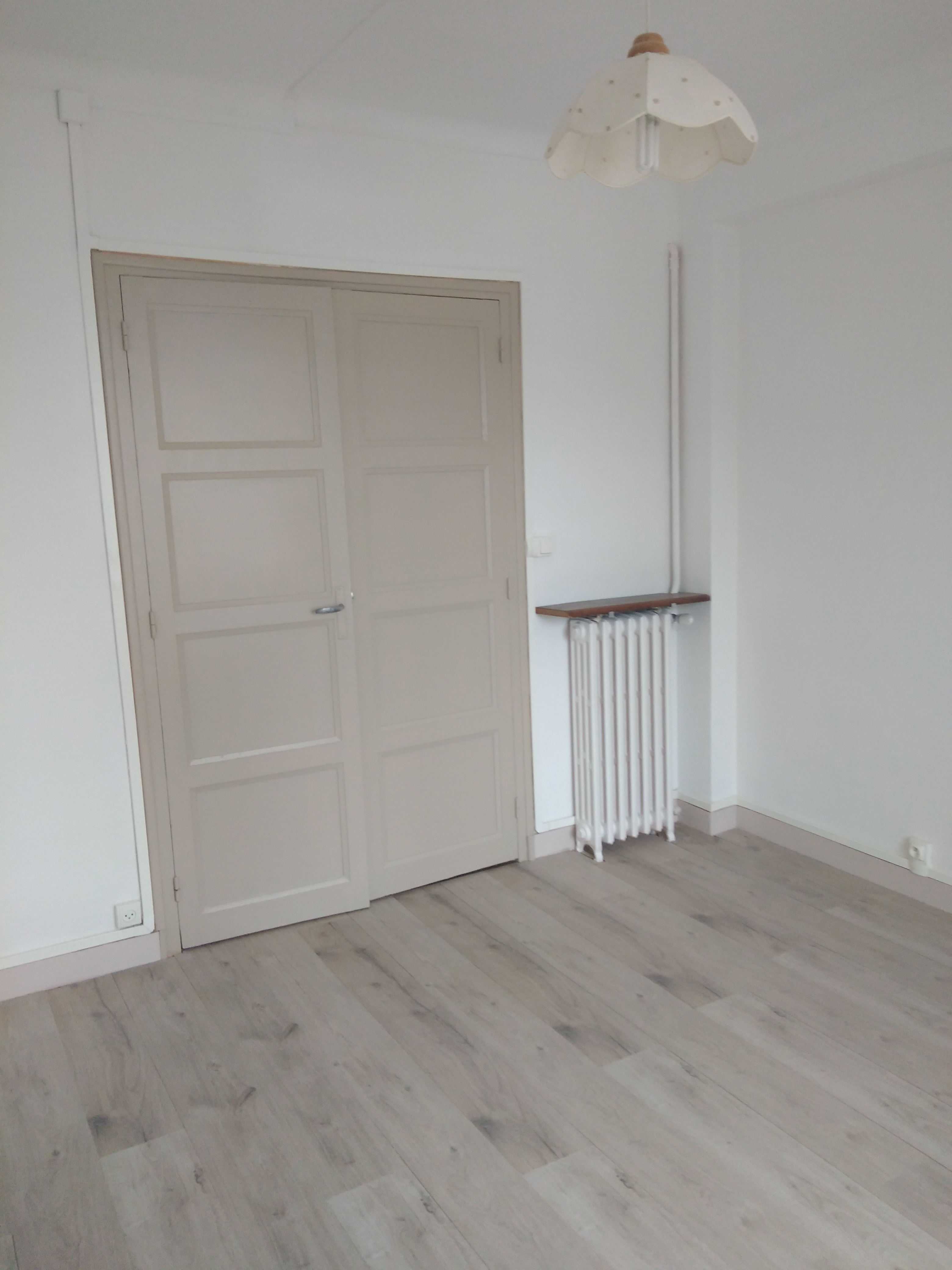 Appartement de type T3 de 78.48 m² avec balcon, cave et garage 