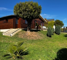 Pavillon de style chalet de 50.28m² avec jardin clôturé, terrasse et garage à Le Vauvreuil